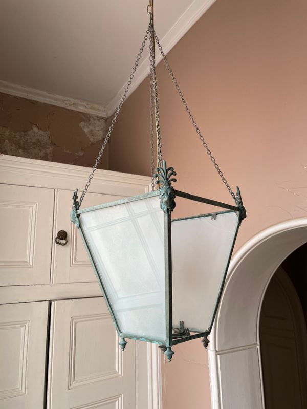 A REGENCY METAL AND GLAZED CEILING LANTERN,