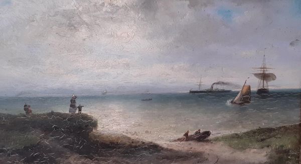 ENGLISH SCHOOL, 19TH CENTURY Figures on the coast watching a fishing boat being pulled ashore