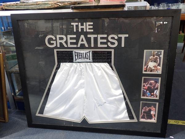 MUHAMMAD ALI, A SIGNED PAIR OF BOXING SHORTS