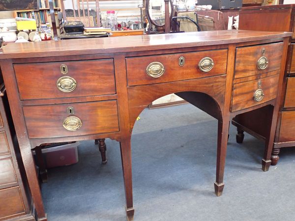 A GEORGE III MAHOGANY BOW-FRONTED SIDEBOARD