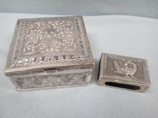 AN EASTERN WHITE METAL CIGARETTE BOX