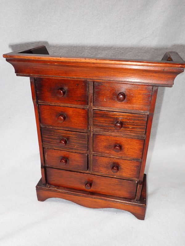 AN EARLY 20TH CENTURY APPRENTICE CHEST OF DRAWERS