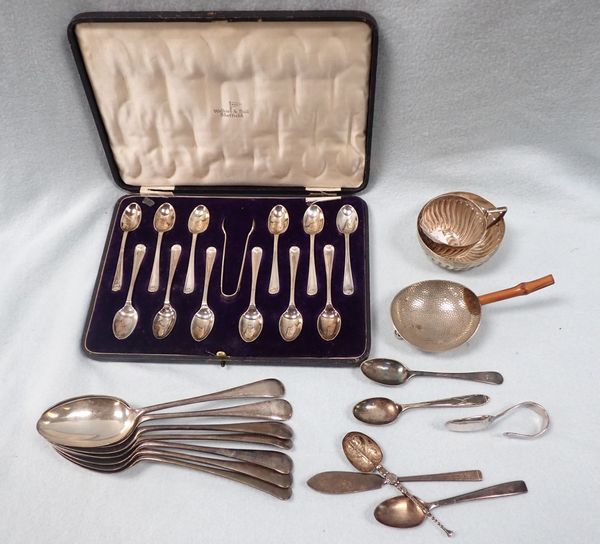 A CASED SET OF TWELVE TEASPOONS AND SUGAR TONGS