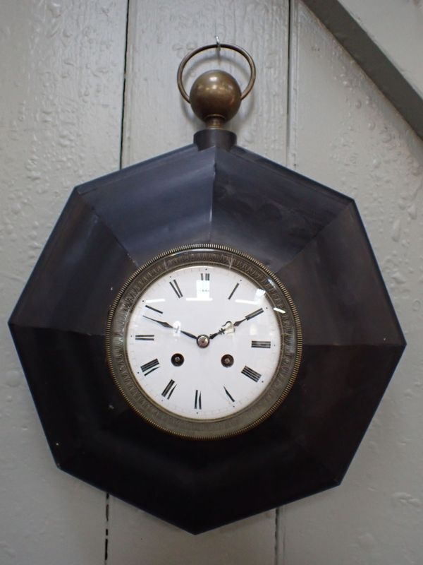 A 19TH CENTURY FRENCH TOLEWARE WALL CLOCK