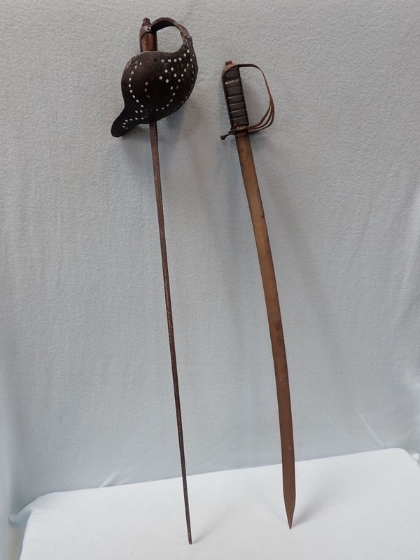 AN ANTIQUE FENCING FOIL