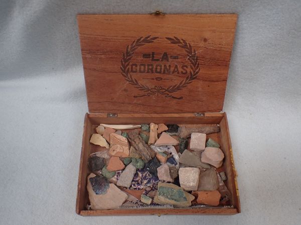 A CIGAR BOX OF ANTIQUITIES