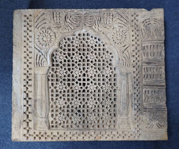 A LEVANTINE/ISLAMIC CARVED LIMESTONE RELIEF PANEL