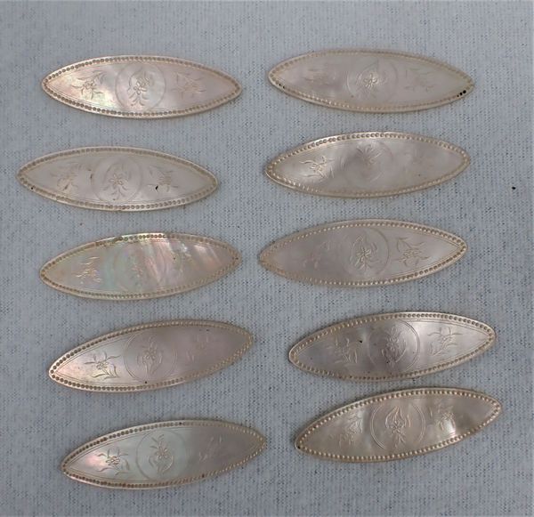 TEN CHINESE MOTHER-OF-PEARL GAMING COUNTERS