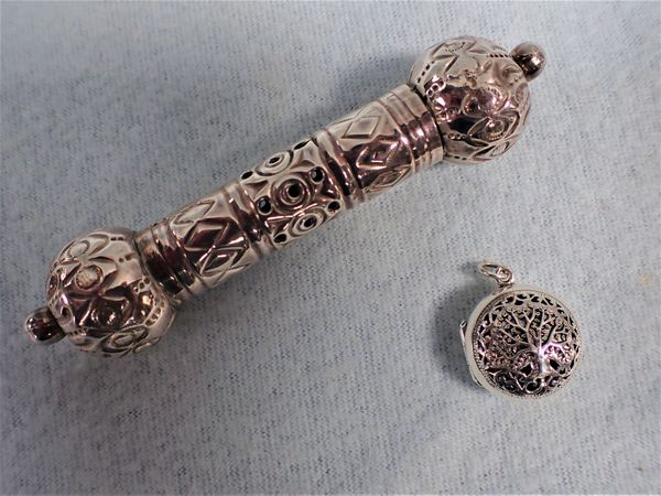 A SILVER ISLAMIC MINIATURE SCROLL HOLDER