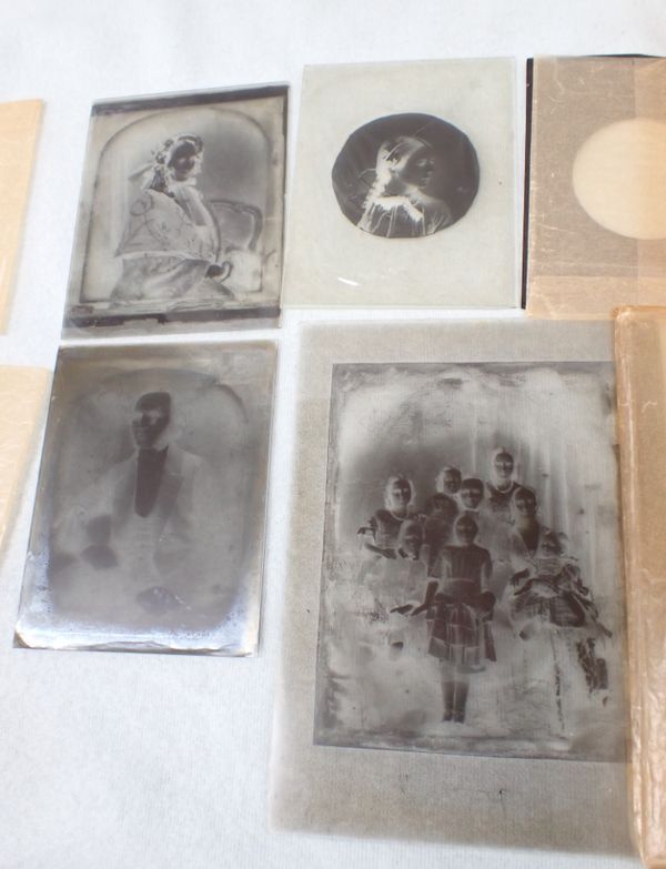 FOUR VICTORIAN GLASS-PLATE PHOTOGRAPHIC NEGATIVES