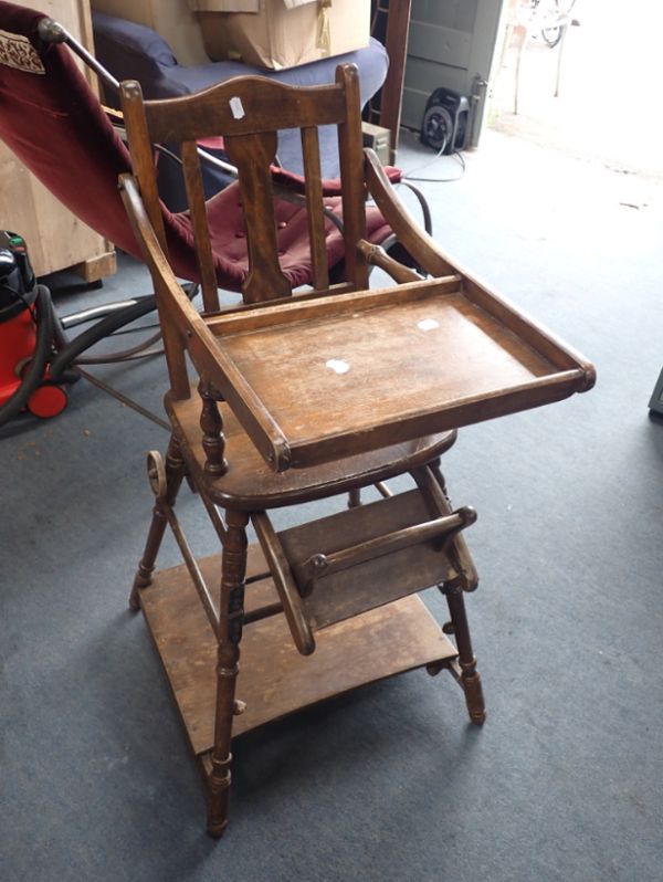 AN EARLY 20TH CENTURY METAMORPHIC CHILD'S HIGH CHAIR