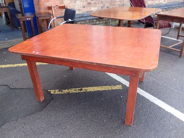 A LARGE MODERN TABLE