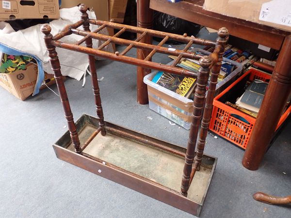 A LATE VICTORIAN STAINED BEECH STICK STAND