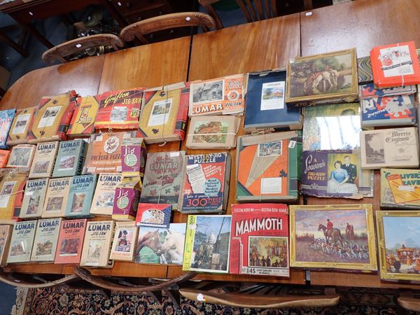 A COLLECTION OF VINTAGE JIG-SAW PUZZLES