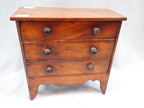 A 19TH CENTURY MINIATURE OR 'APPRENTICE' CHEST OF DRAWERS