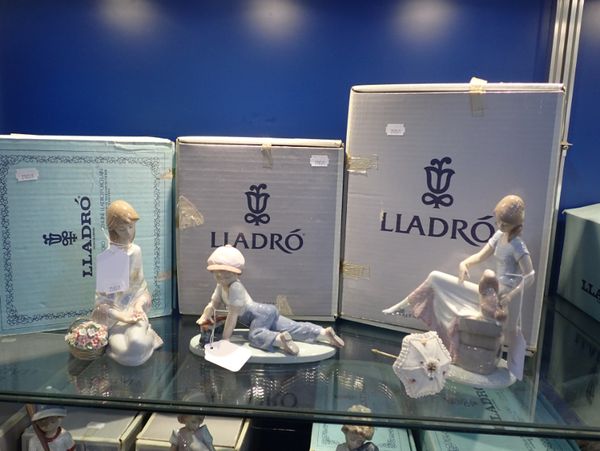 LLADRO COLLECTOR'S SOCIETY; 'ALL ABOARD', 'PICTURE PERFECT' AND 'CANCION DE PRIMAVERA'