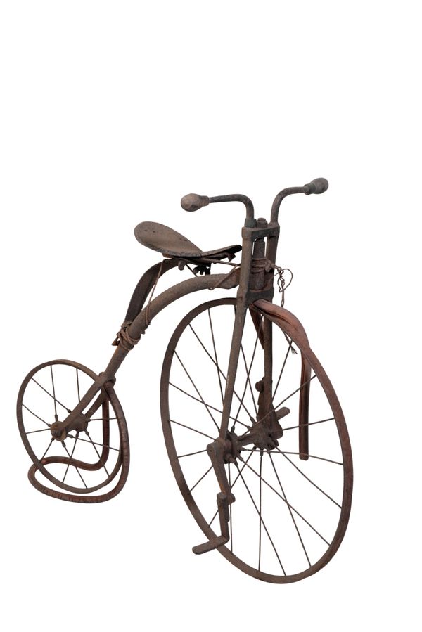 A CHILDS PENNY FARTHING BICYCLE