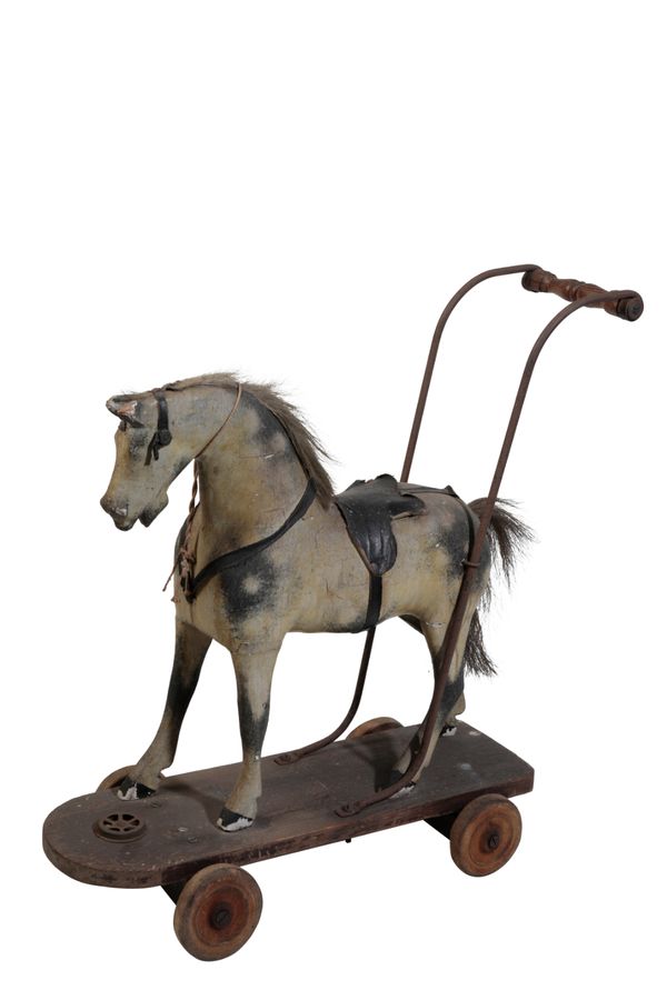 A VICTORIAN WOODEN PUSH-ALONG HORSE TOY