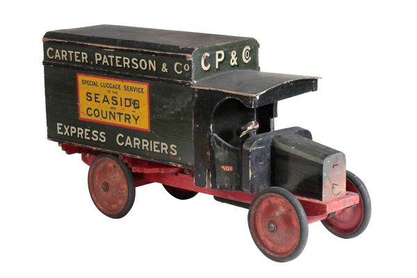 A 1930'S WOODEN TOY TRUCK
