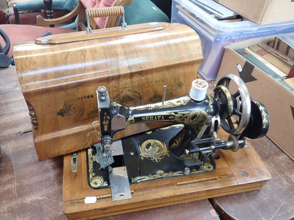 A VINTAGE 'SERATA' HAND SEWING MACHINE