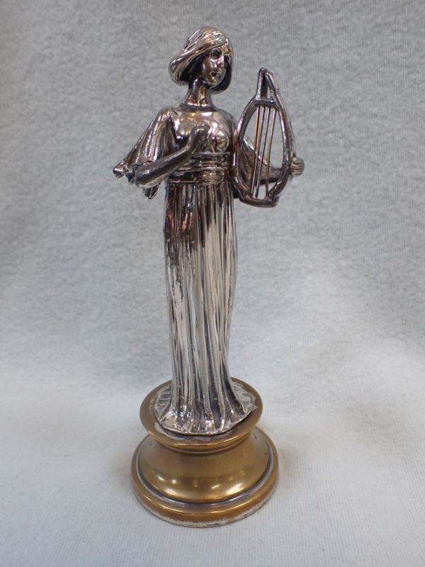 AN ART NOUVEAU PLATED FIGURINE