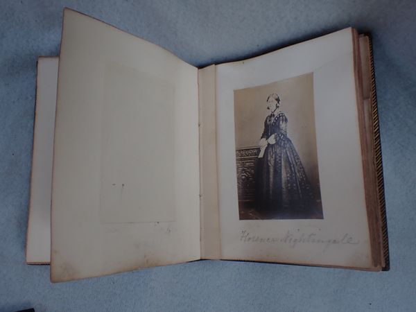 A SMALL 19TH CENTURY PHOTOGRAPH ALBUM