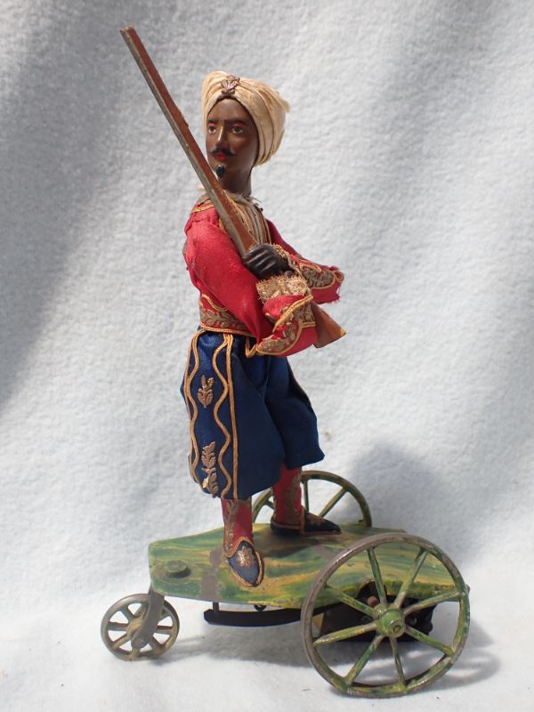 A MECHANICAL TOY INDIAN SOLDIER, BY A. THEROUDE