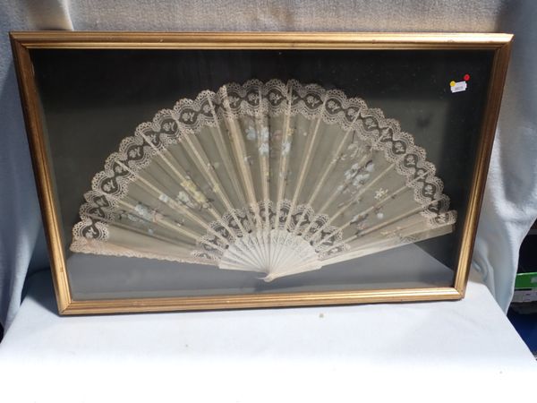 A VICTORIAN CARVED BONE FAN