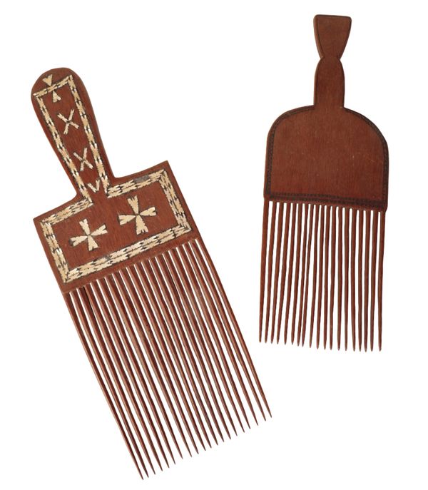 TWO LATE 19TH CENTURY SOLOMON TRIBAL HAND COMBS