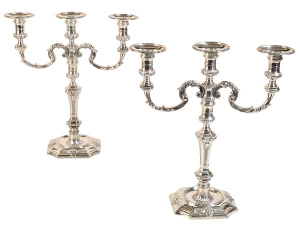 A PAIR OF GEORGE II STYLE SILVER THREE LIGHT CANDELABRA