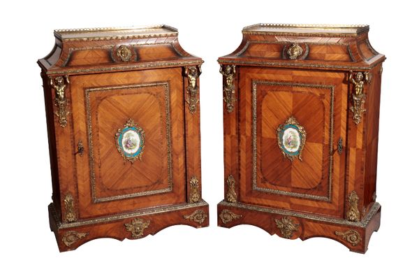 A PAIR OF KINGWOOD AND TULIPWOOD VENEERED AND GILT METAL MOUNTED SIDE CABINETS IN LOUIS XV /XVI TRANSITIONAL STYLE,