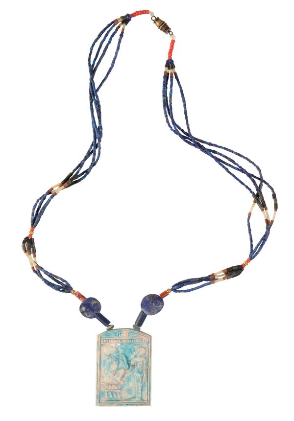 AN EGYPTIAN BEAD NECKLACE WITH TABLET PENDANT