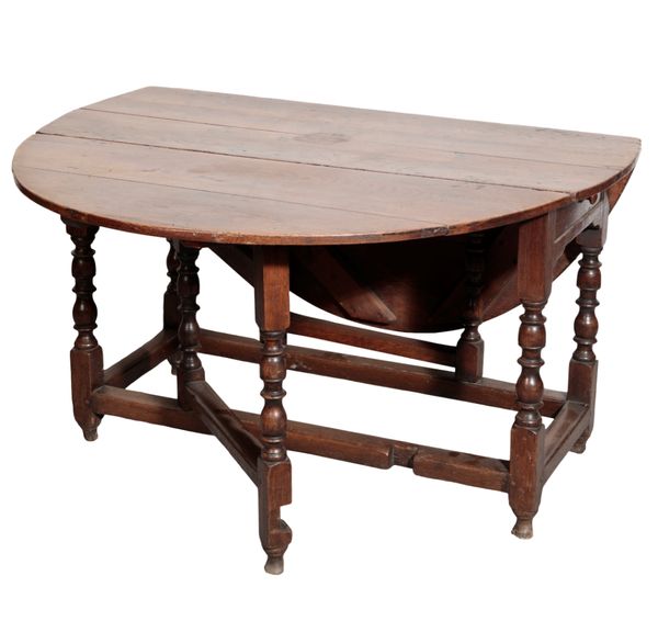 AN OAK GATELEG TABLE IN JACOBEAN STYLE,