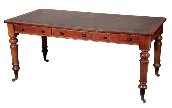 A VICTORIAN MAHOGANY AND LEATHER INSET LIBRARY TABLE,