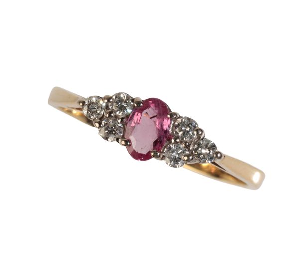 A RUBY AND DIAMOND CLUSTER RING