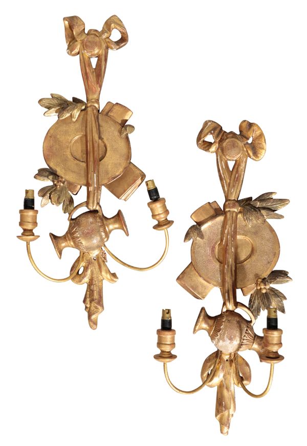 A PAIR OF CARVED AND GILTWOOD TWIN LIGHT WALL APPLIQUES,