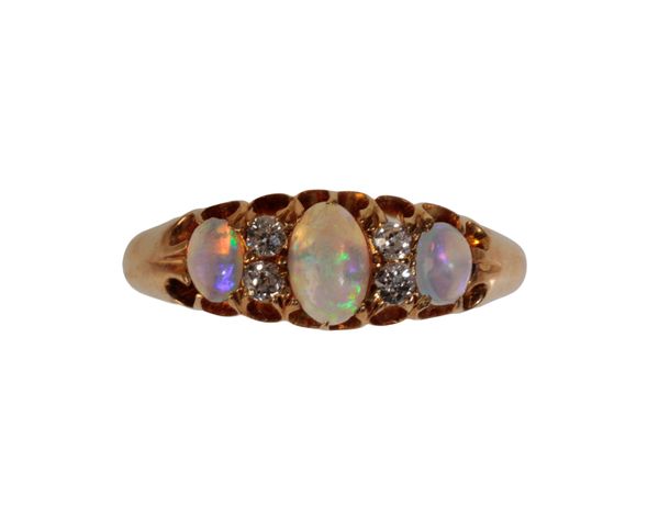 AN OPAL AND DIAMOND GYPSY STYLE RING