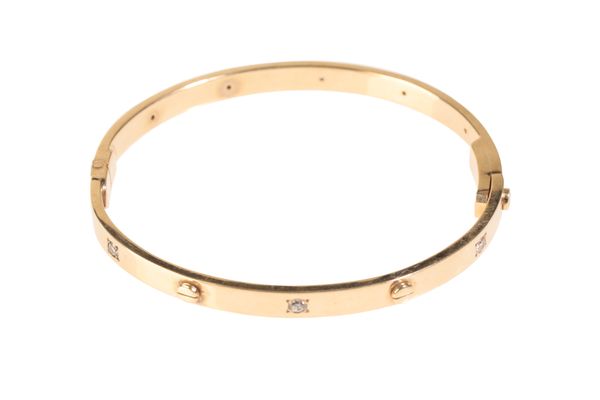 A CARTIER STYLE YELLOW GOLD LOVE BANGLE