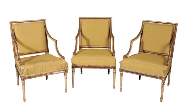 A SET OF THREE GEORGE III GILTWOOD AND GILT-COMPOSITION WHITE-PAINTED ARMCHAIRS