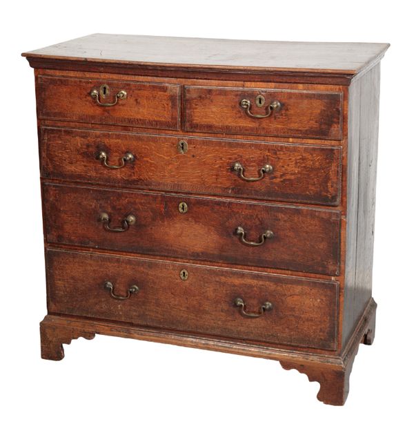 A GEORGE III OAK AND WALNUT CROSSBANDED CHEST OF DRAWERS,
