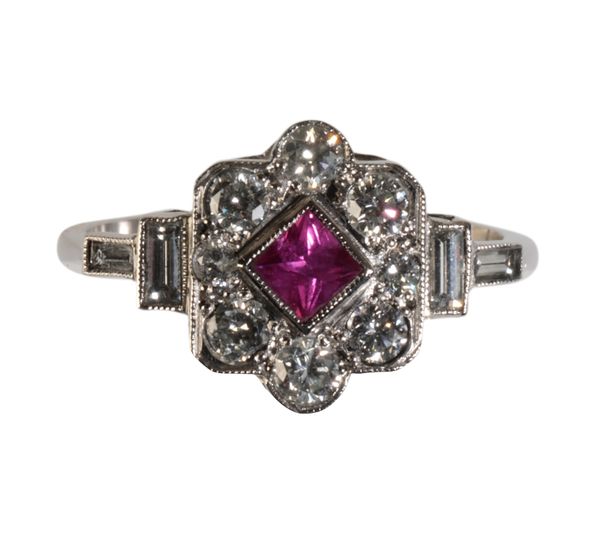 AN ART DECO DIAMOND AND RUBY CLUSTER RING