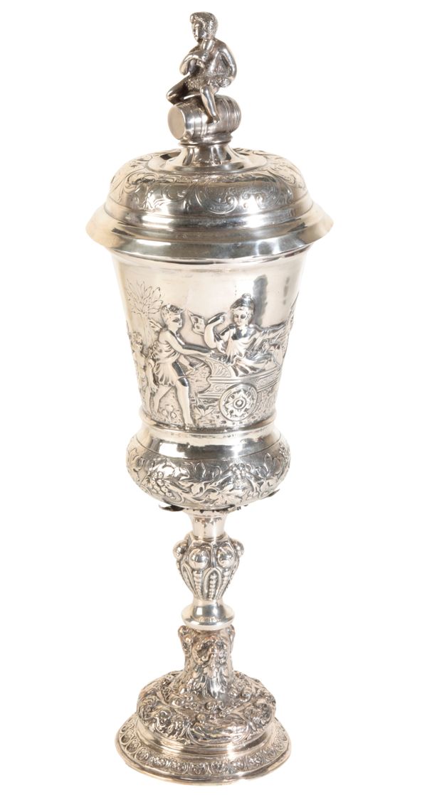 A LATE 19TH CENTURY SILVER CUP AND COVER