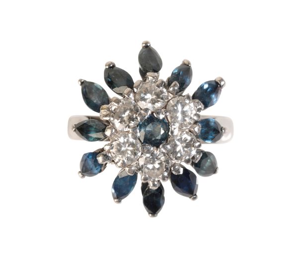 A SAPPHIRE AND DIAMOND CLUSTER RING