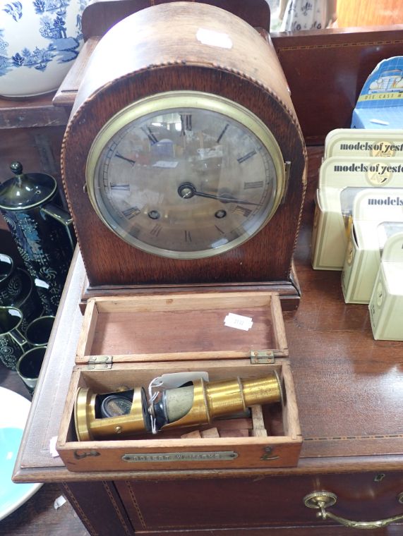 A 1920S OAK CASED MANTEL CLOCK