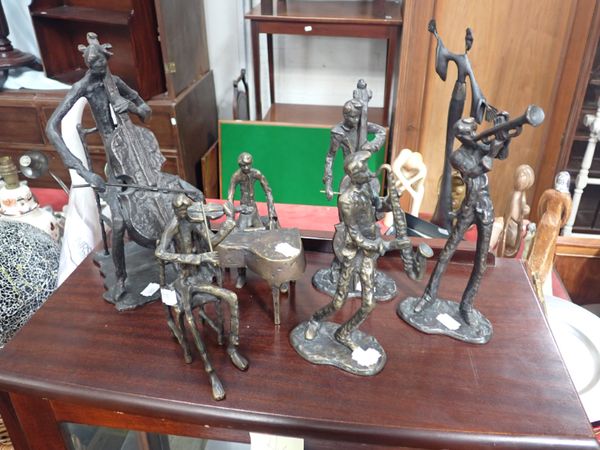 A COLLECTION OF CAST METAL MUSICIANS