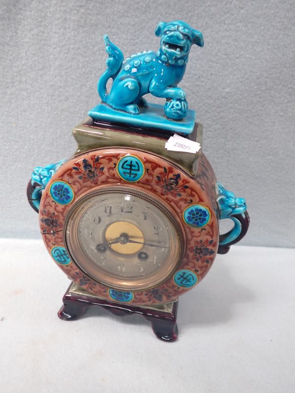 A VICTORIAN GLAZED CERAMIC MANTEL CLOCK