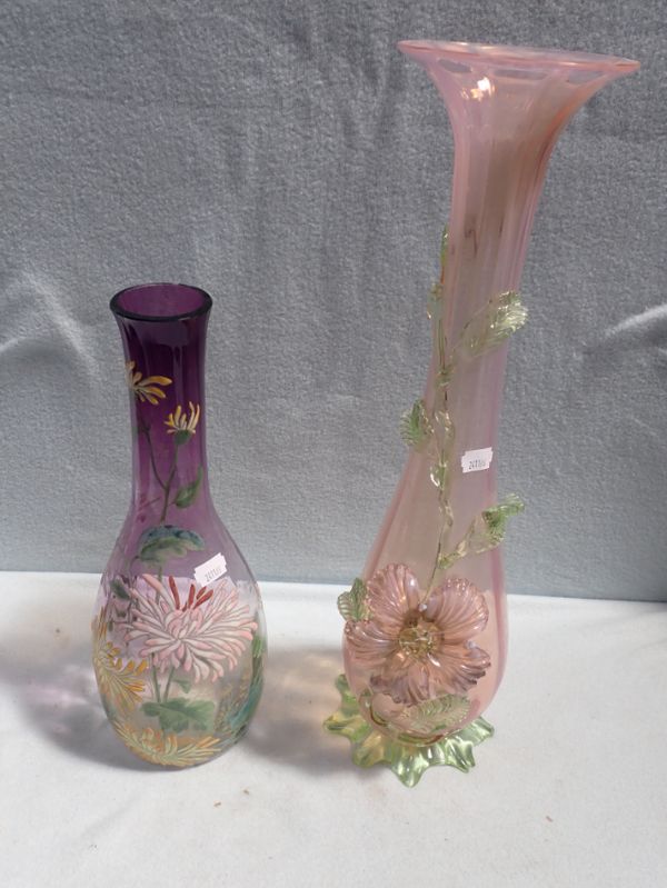 A VICTORIAN PURPLE GLASS BOTTLE VASE