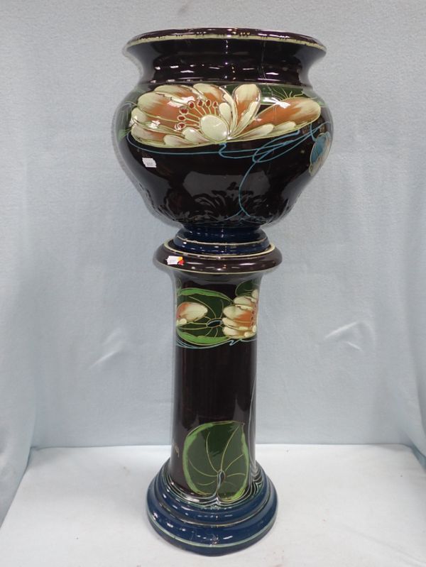 AN EDWARDIAN ART NOUVEAU JARDINIERE AND STAND