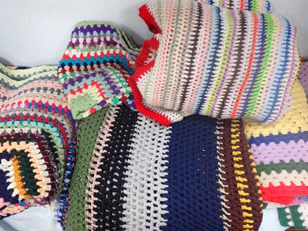 A COLLECTION OF CROCHETED BLANKETS