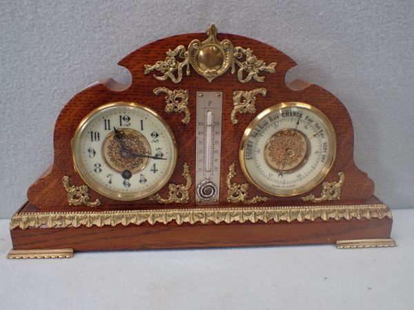 A LATE VICTORIAN CLOCK/BAROMETER/THERMOMETER